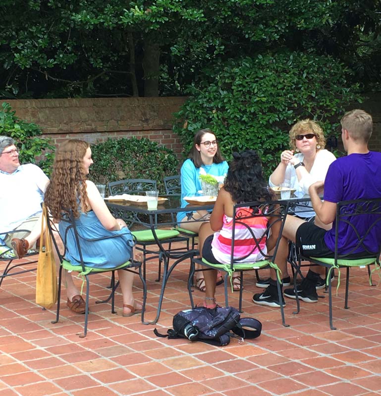 President Elizabeth Davis and Charles Davis visiting with the scholars at White Oaks