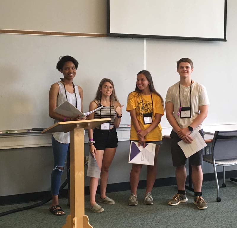 Presentation of Youth Declaration. (l-r) Tyler Gainer, Gabie Giers, Hanna Trayhan and Tom Whittemore