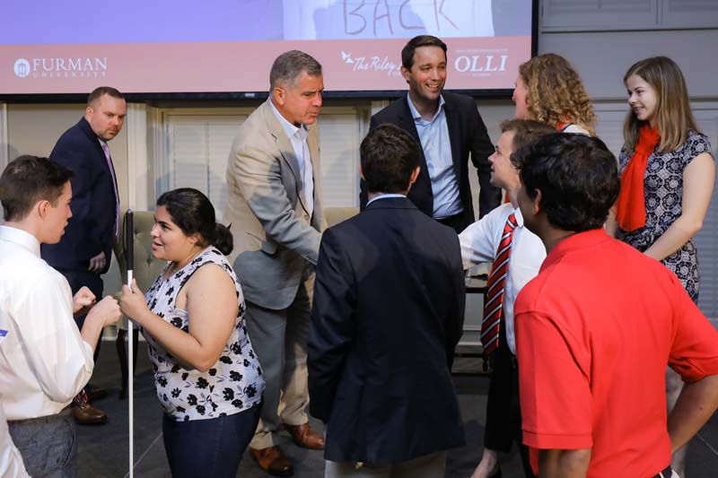 StraightTalk 2019: Advance Team members Spencer Richardson and Kenia Flores to the far left; Tyler Lininger, Johnny Aluri, and Jackson Brown speaking with Chris Ballard; and Mattie MacDonald and Elizabeth Hogue on stage speaking with Bart Bonikowski