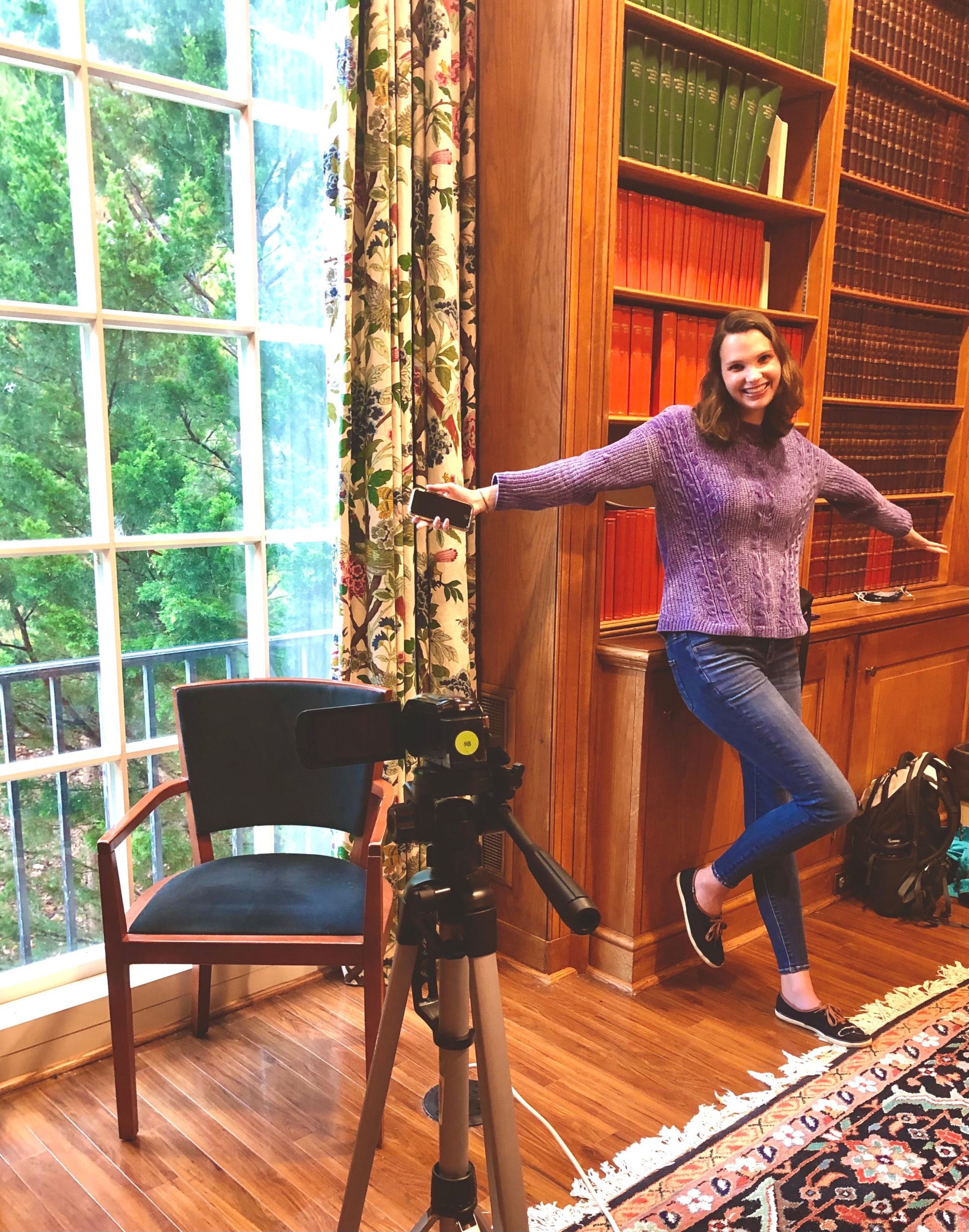 Lauren Garrison prepares to interview Furman politics professor, Dr. Katherine Kaup, on camera