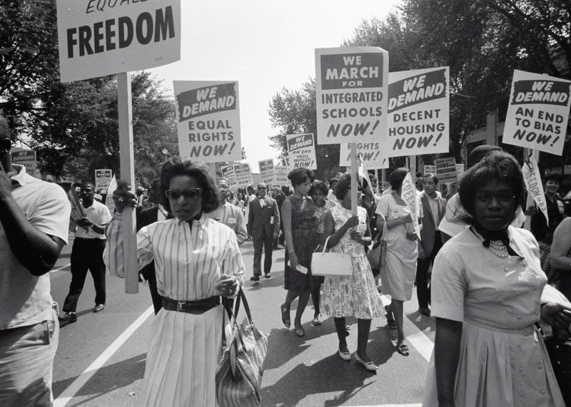 Women marching for integrated schools