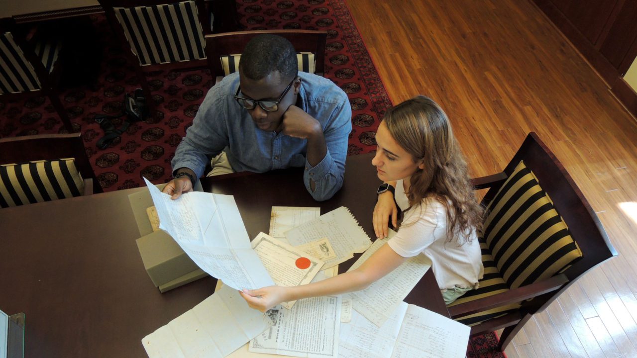 Student studying texts in special collections