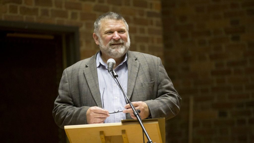 man delivering a speech