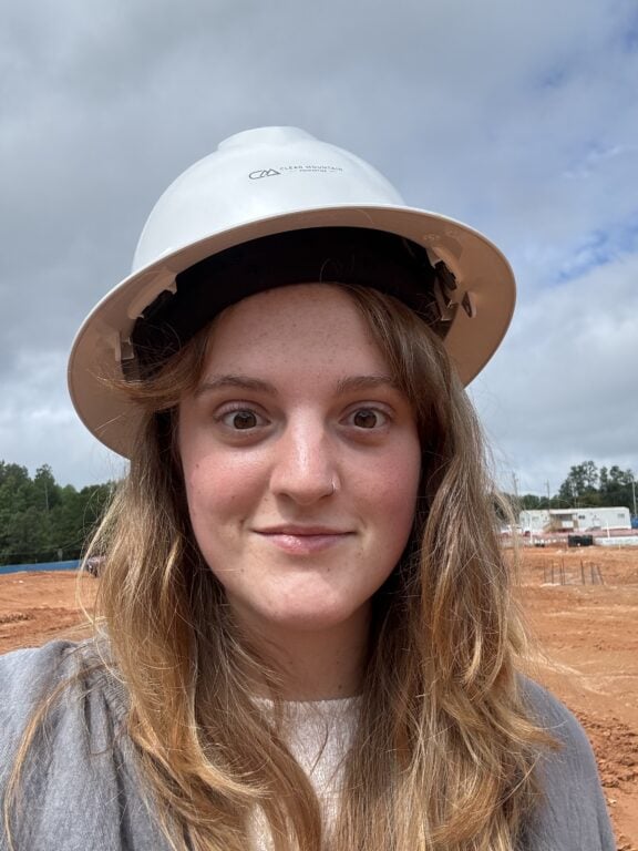 Female student wearing a hardhat
