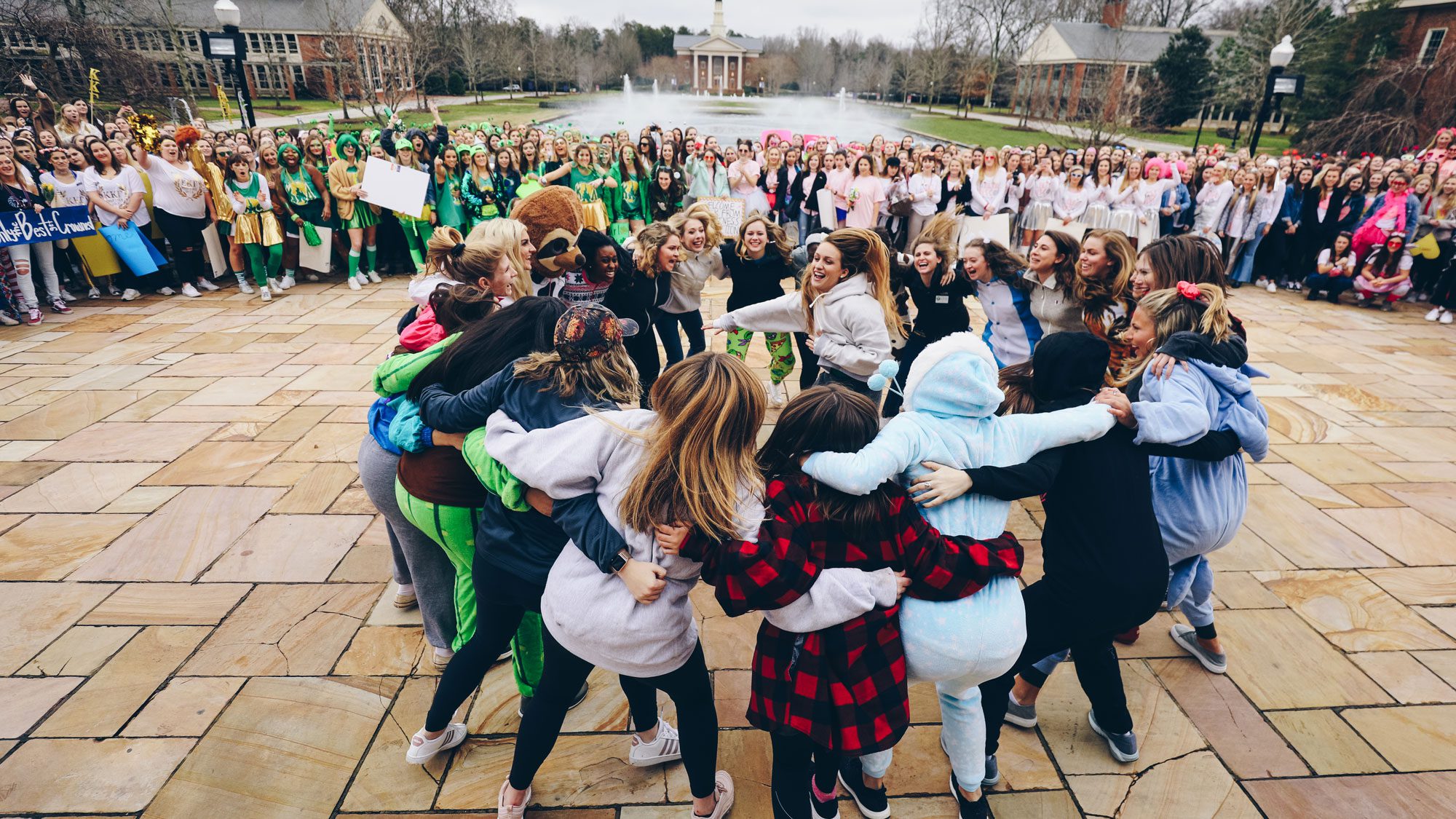Students during bid day celebrating in a circle