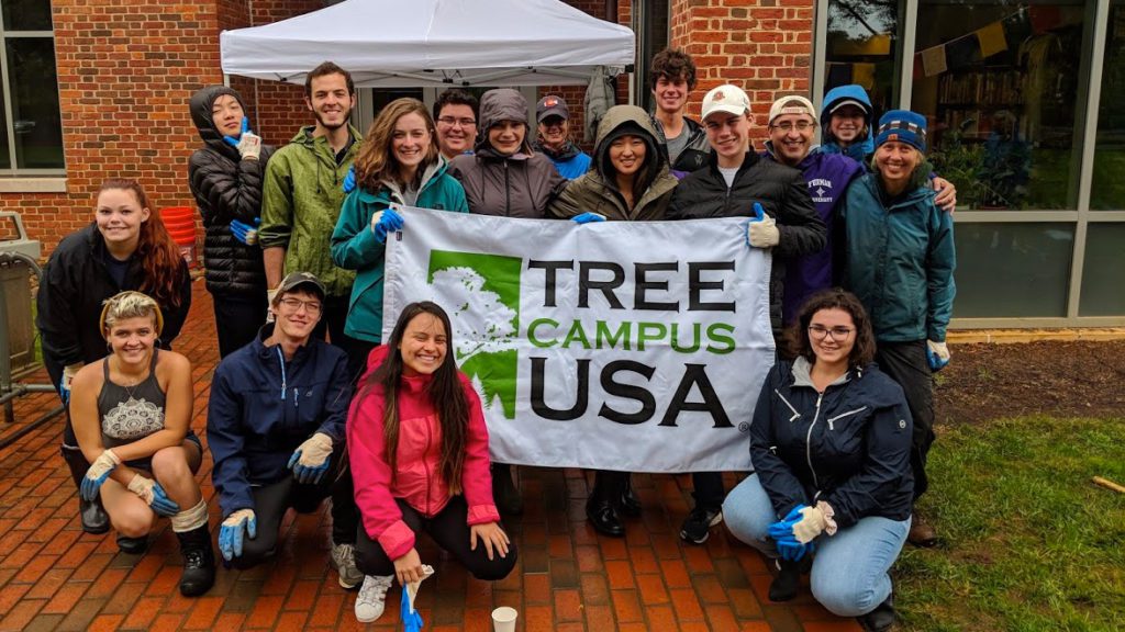 Tree Campus USA banner held up by students