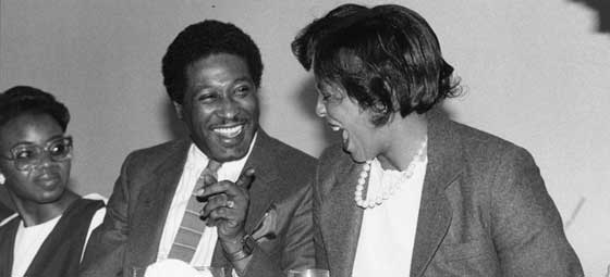 black and white photo of people laughing