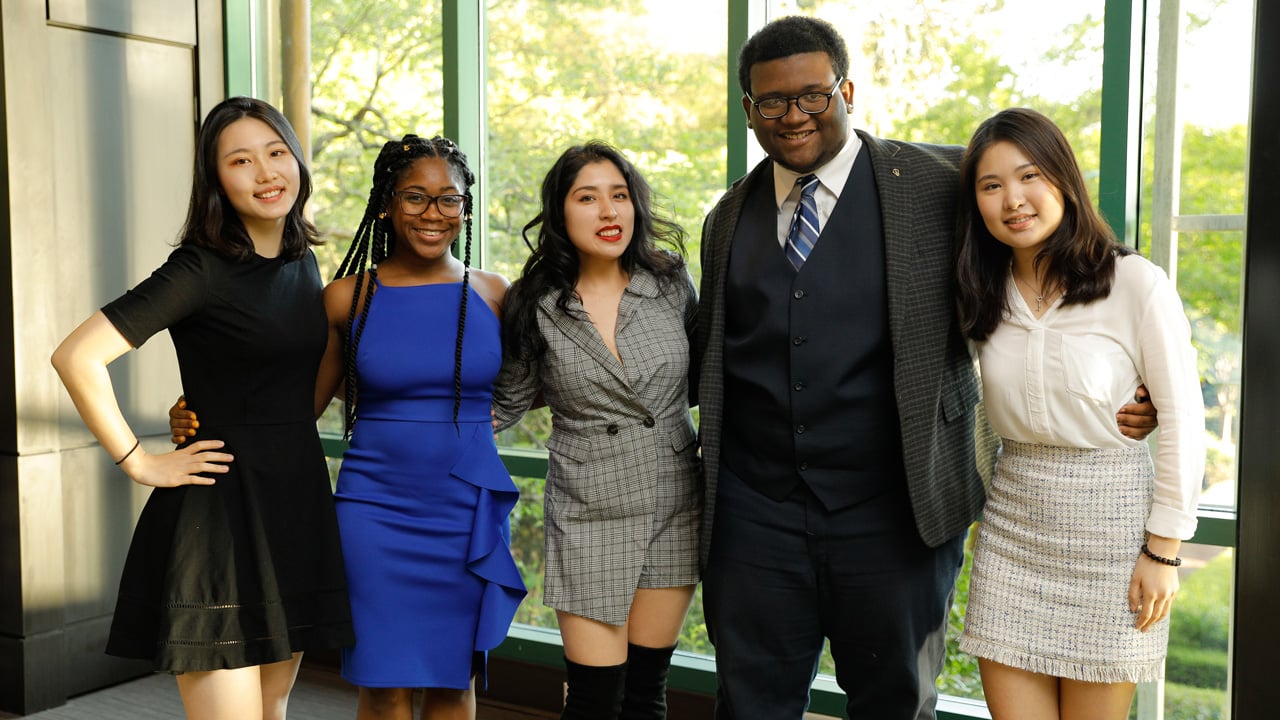Students smiling for a group photo
