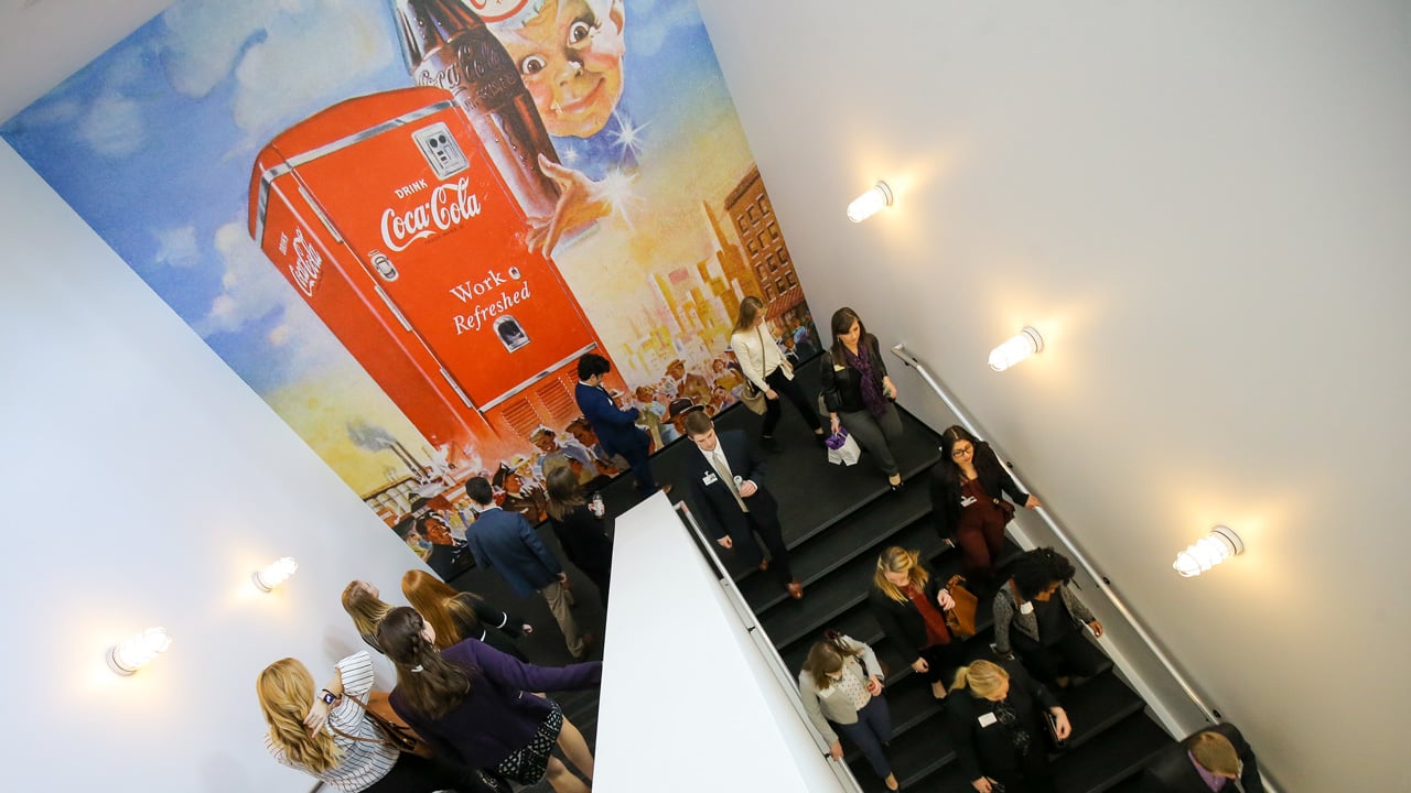 Students walking down a flight of stairs