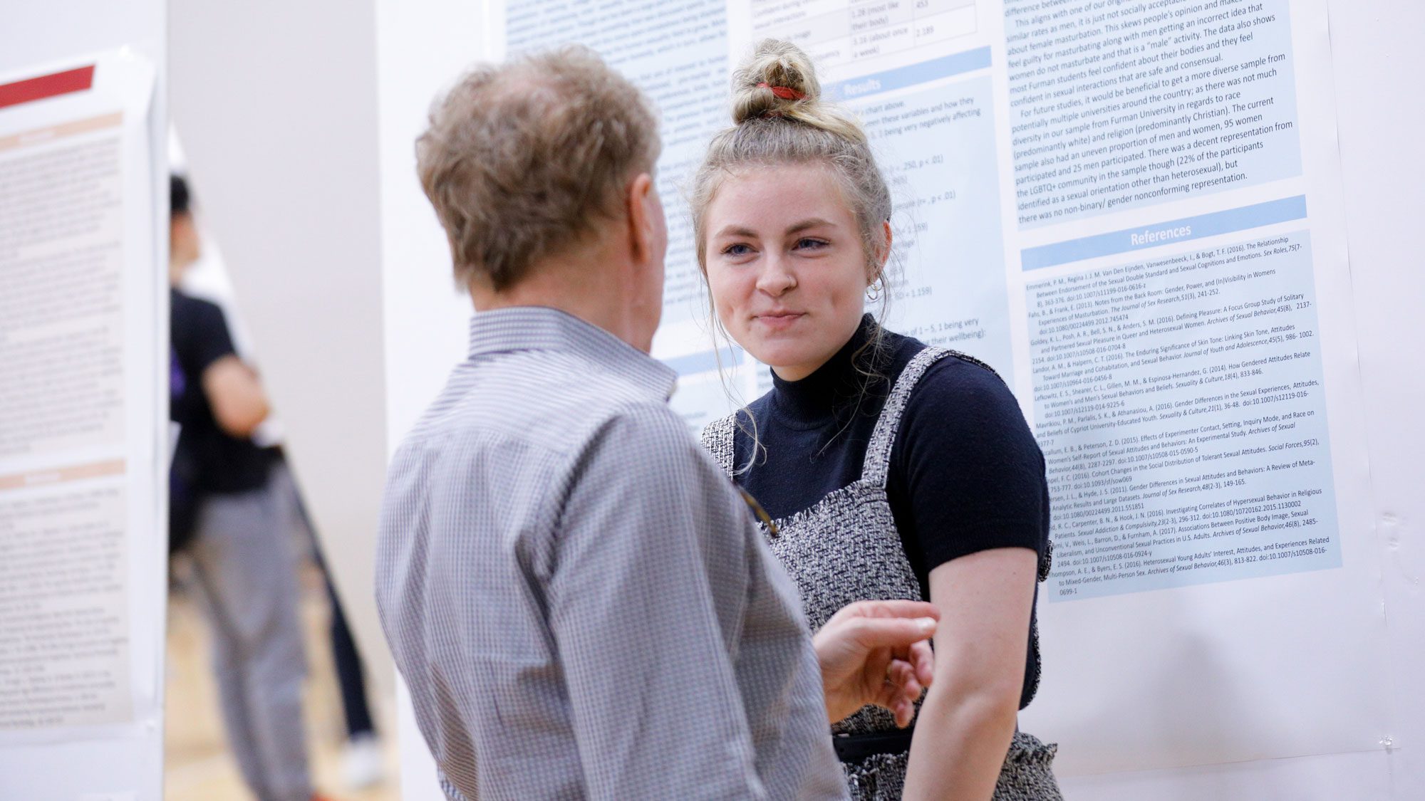 Student presenting her board