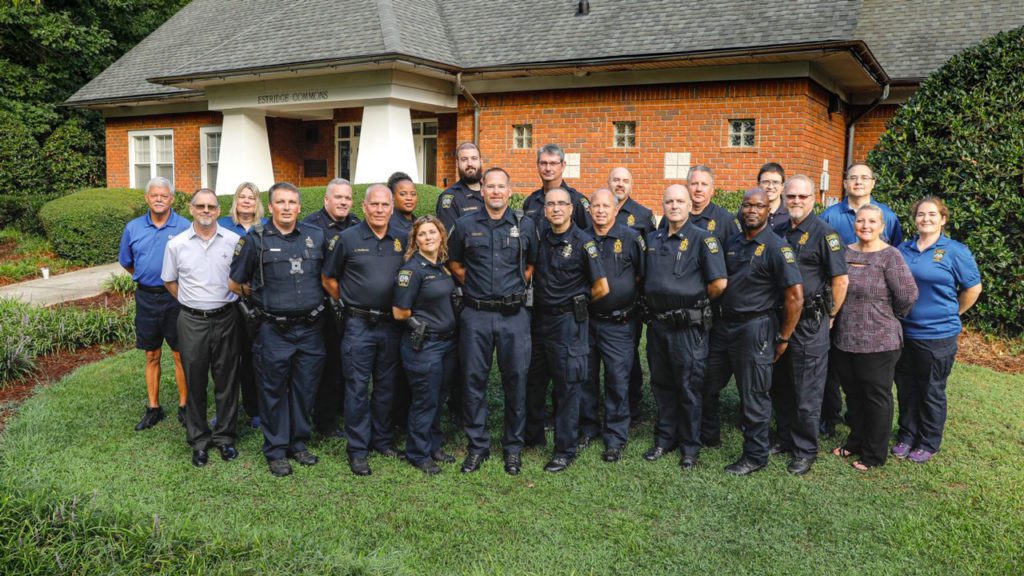 Police officers and staff outside police building on Furman's campus