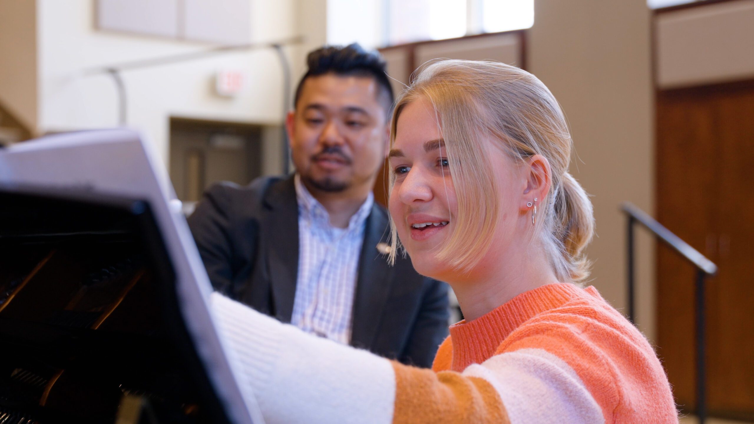 Faculty and student working together